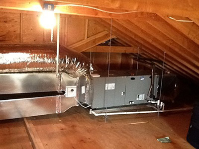 Clean attic installation of duct work and a horizontal, gas-fired furnace.